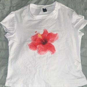 SHEIN: white short sleeve shirt with a flower on the front